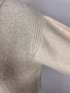 Maglia scollo a V con spacchi in filato di cashmere e lana.