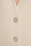 Cardigan in filato di lana merinos, cashmere e lurex.