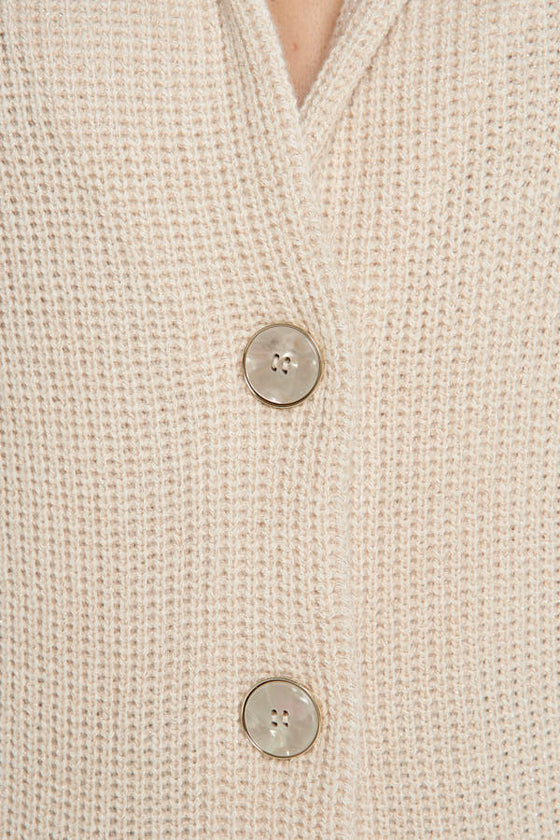 Cardigan in filato di lana merinos, cashmere e lurex.