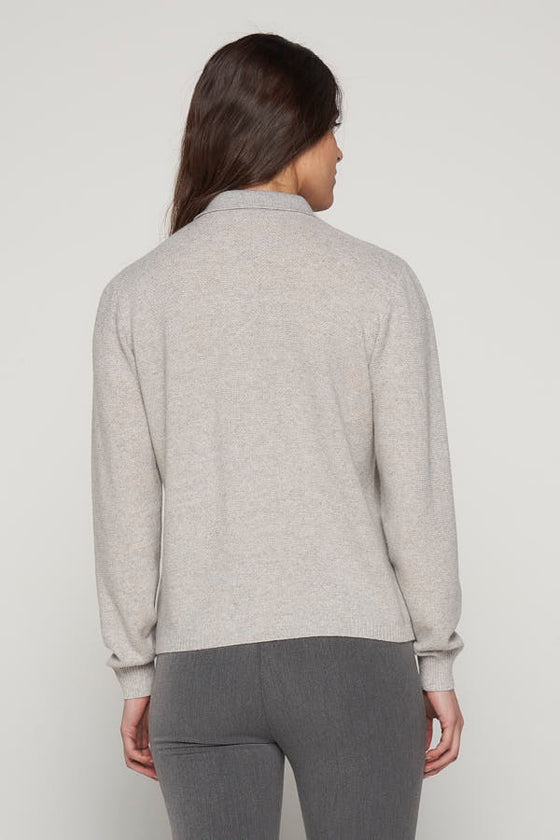 Maglia collo a polo in filato di lana merinos, cashmere e lamè.