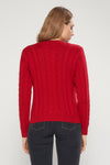 Maglia a trecce e coste in filato di lana merinos e cashmere.
