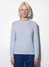 Maglia a trecce in cashmere, seta e lana merinos.