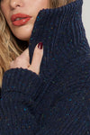 Giacca mezza maglia inglese in filato di lana bouclè.