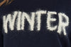 Maglioncino girocollo con scritta"WINTER"in filato di lana merinos e cashmere.
