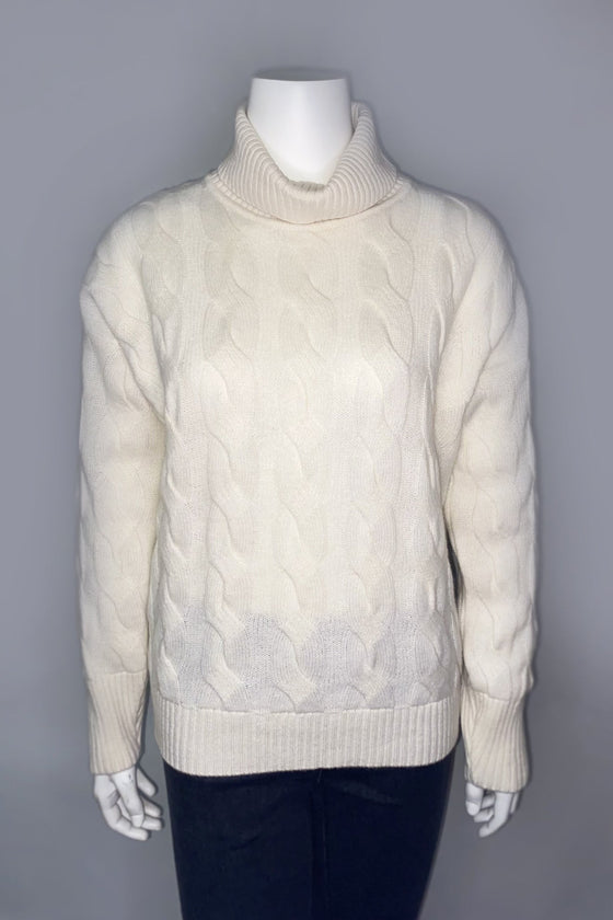 Maglia a trecce in filato di lana e cashmere.